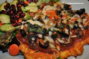 cauliflower pizza and salad