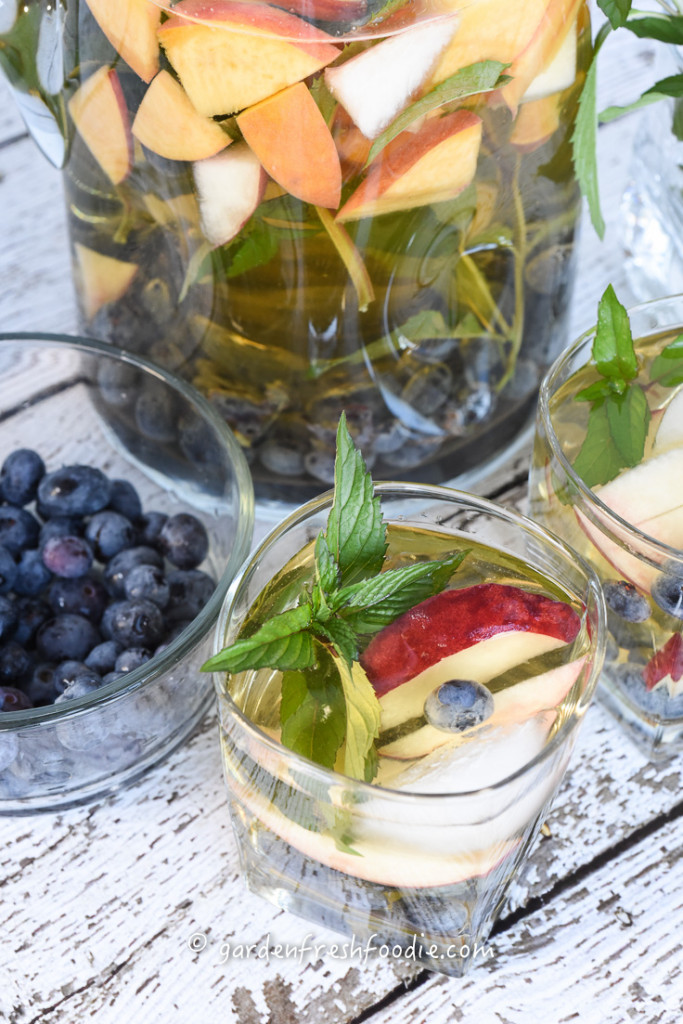 White Wine Sangria With Fresh Peaches, Mint, and Blueberries